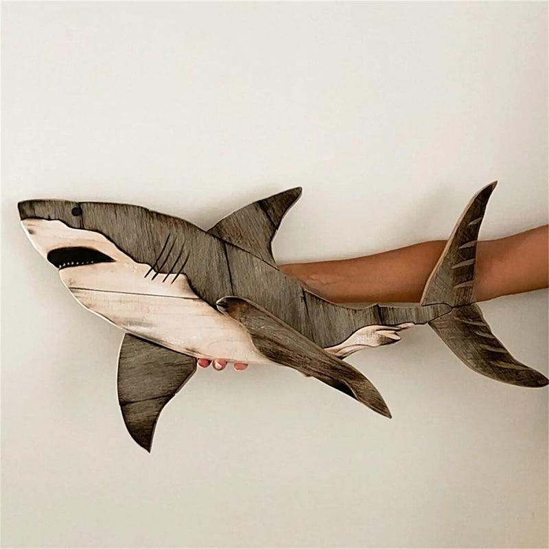 Wooden Shark Wall Decor next to cream colored wall