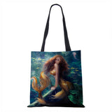 Mermaid and shipwreck tote bag
