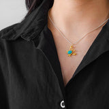 Woman wearing Amazonite and Gold Crab Pendant Necklace