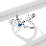 Azure Starfish Open Ring on white table 