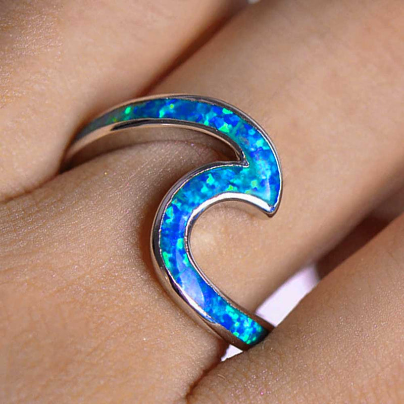 Sterling Silver Silver Opal Wave Ring on index finger