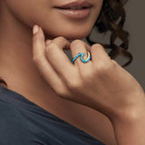 Women wearing a Gold Opal Wave Ring