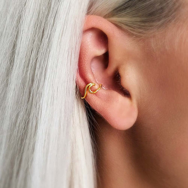 Woman Profile modelling a Gold Wave Cuff Earring