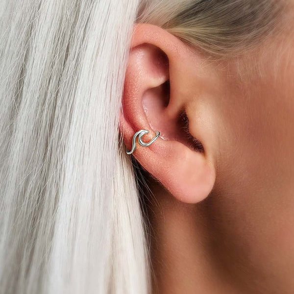 Woman Profile modelling a silver Wave Cuff Earring