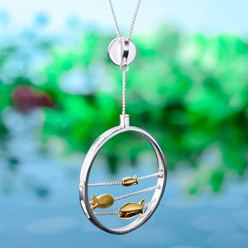 Hanging fish pendant necklace with ocean background