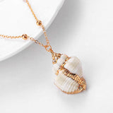 Gold Conch Shell Pendant