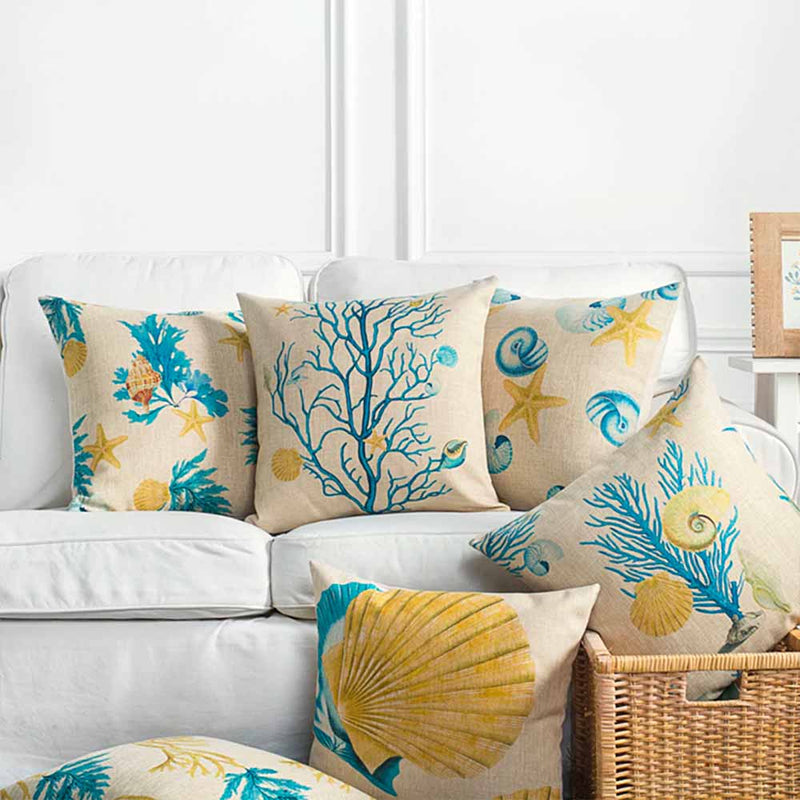Variety of Coral Reef Pillows on sofa