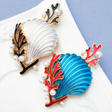 Two Shell & Coral Brooches