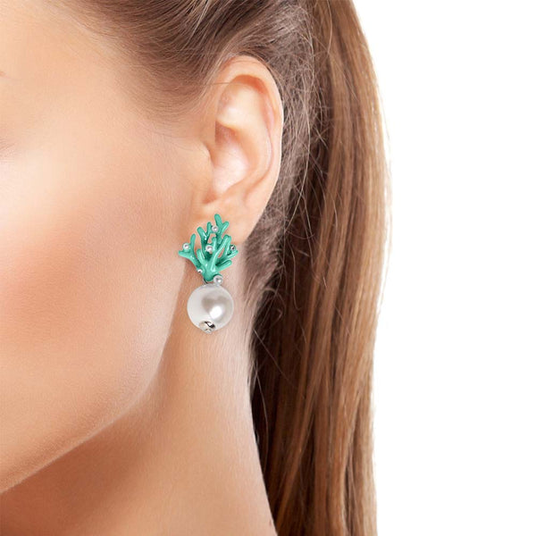 Green coral earrings on model