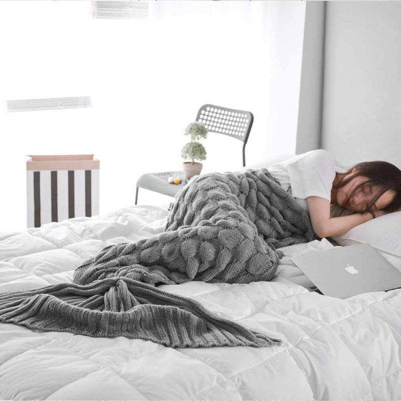 Woman sleeping inside of a Gray Luxury Adults Mermaid Blanket
