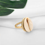 Natural Cowrie Shell set in chunky Gold Ring
