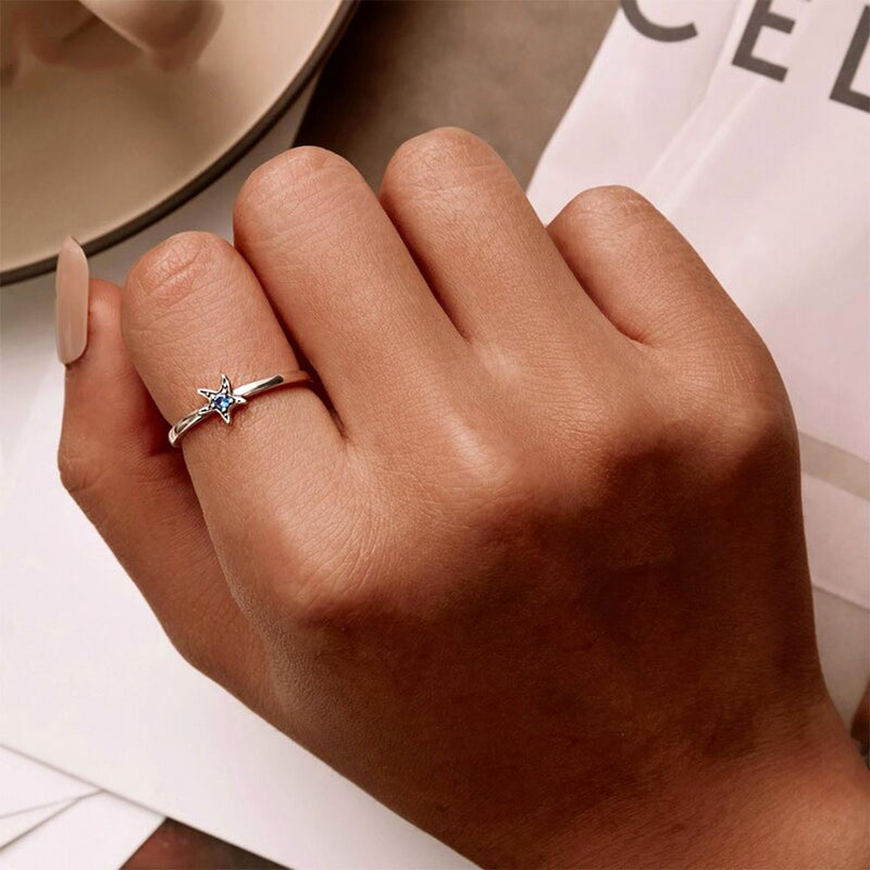 Woman wearing a Blue Crystal Starfish Ring 