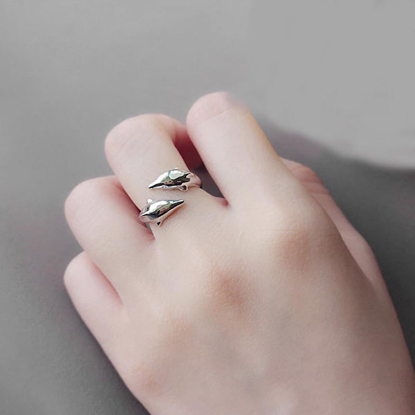 Dolphin wrap Ring on index finger