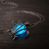 Glowing blue turtle pendant 