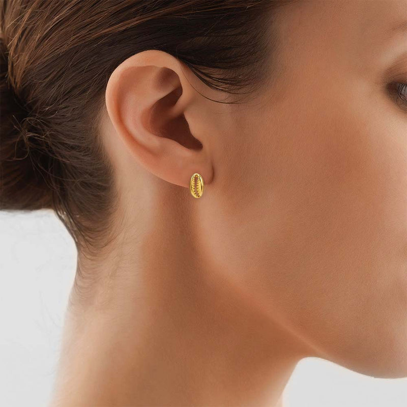 Profile of Model wearing a Gold Cowrie Shell Stud