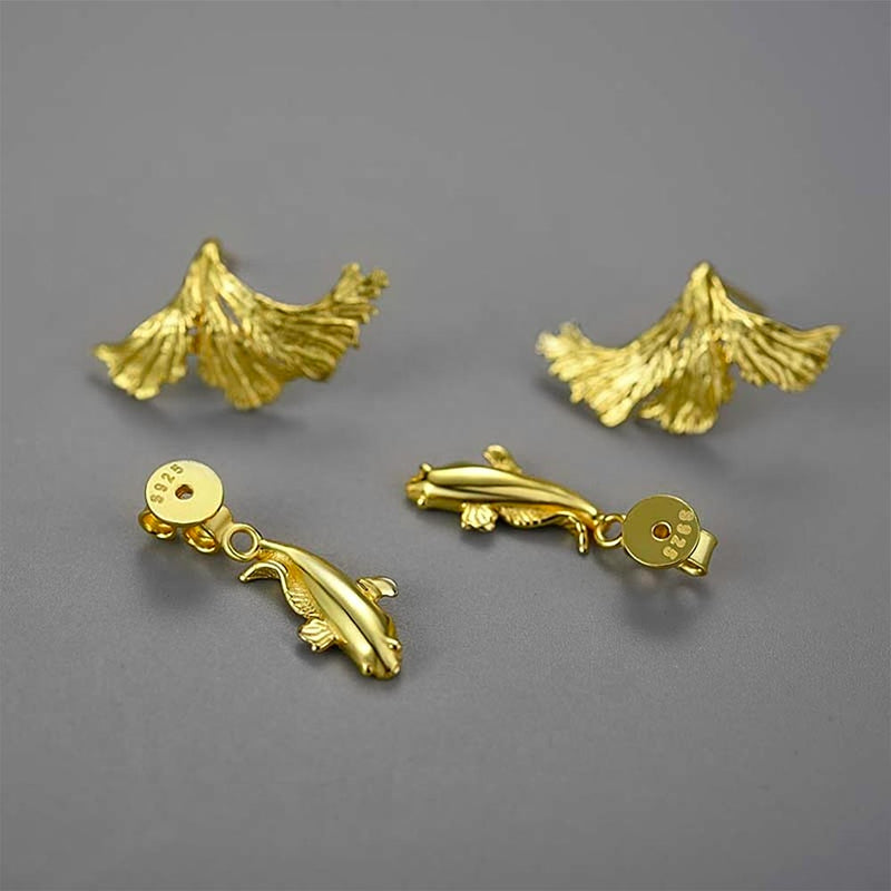 Double-sided gold fish studs 