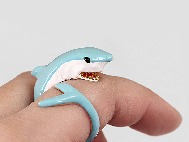 Great white shark ring on finger