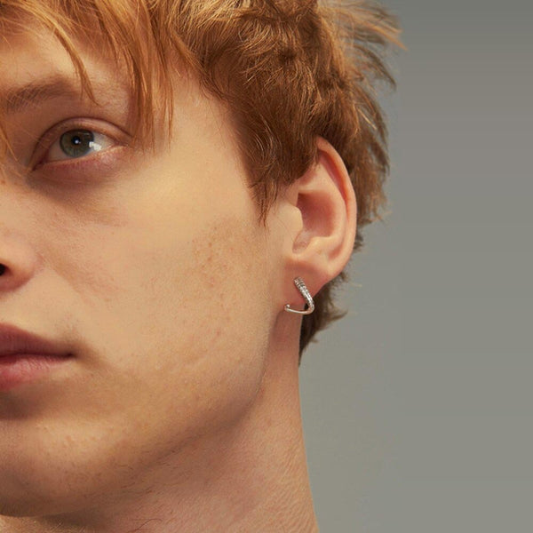 Male model wearing a Men's Silver Octopus Earrings