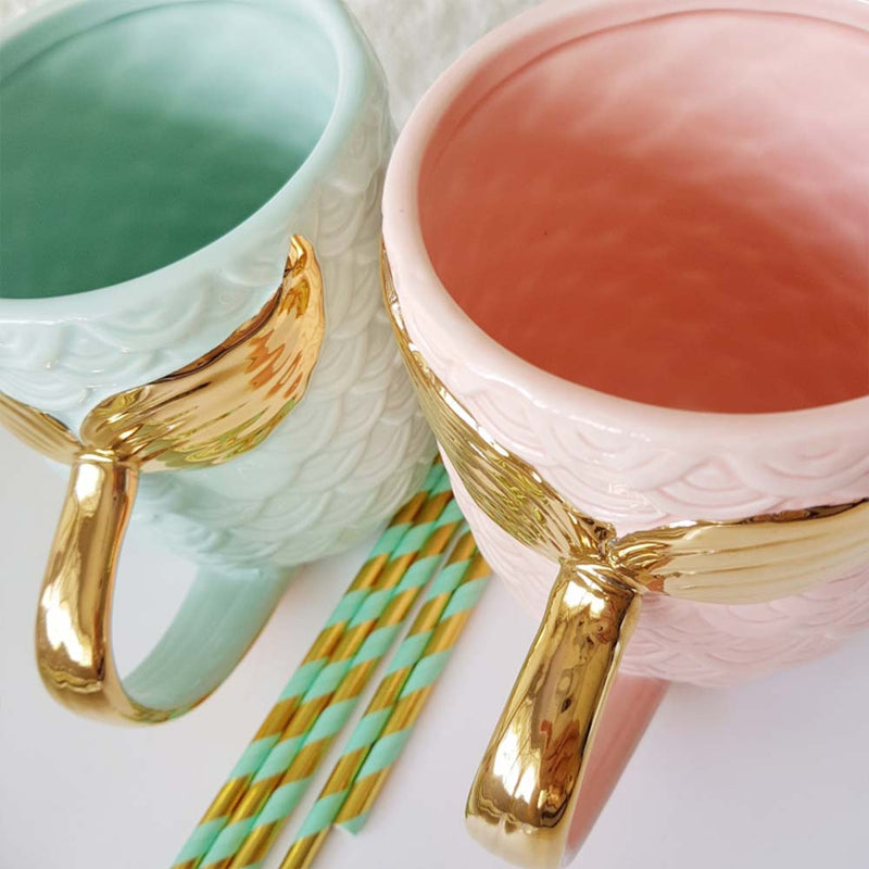 Glazed Ceramic Mermaid Mugs on table