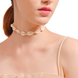 Woman wearing a White Cowrie shell Choker