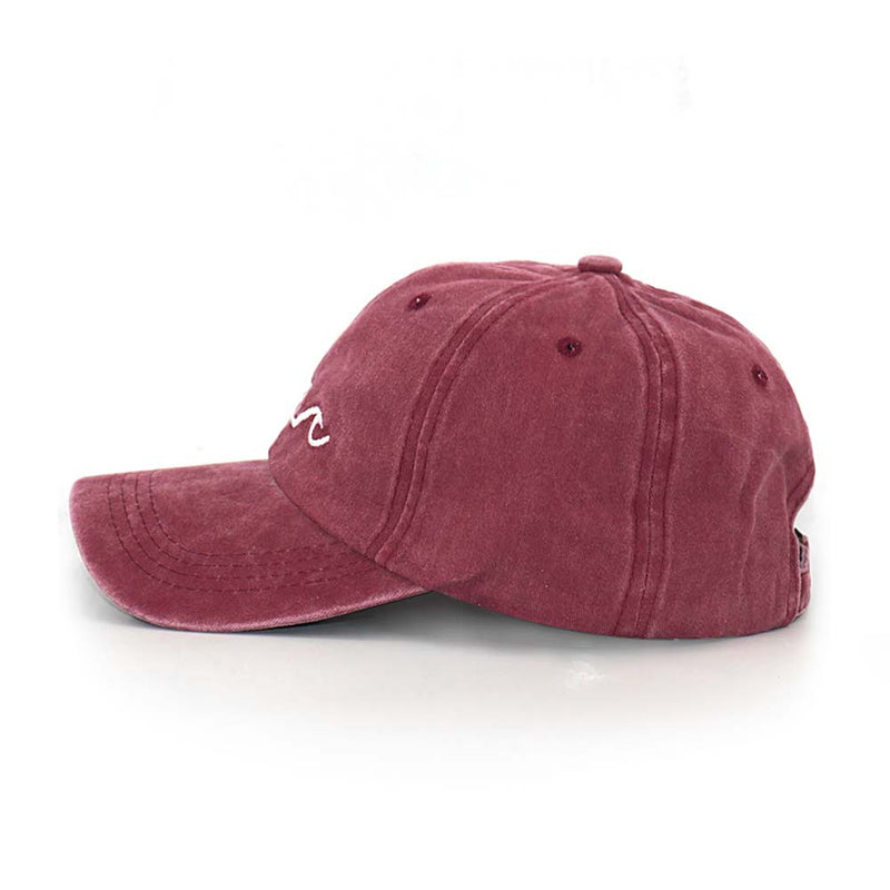 Side view of red baseball cap on white background