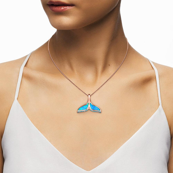 Women wearing a mermaid fin pendant necklace