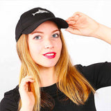 Woman wearing a Black Shark Baseball Cap