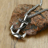 Front view of a Silver Anchor Necklace on rock display