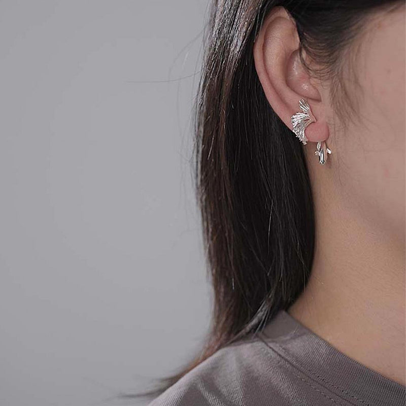female model wearing silver a Betta Koi Earring 