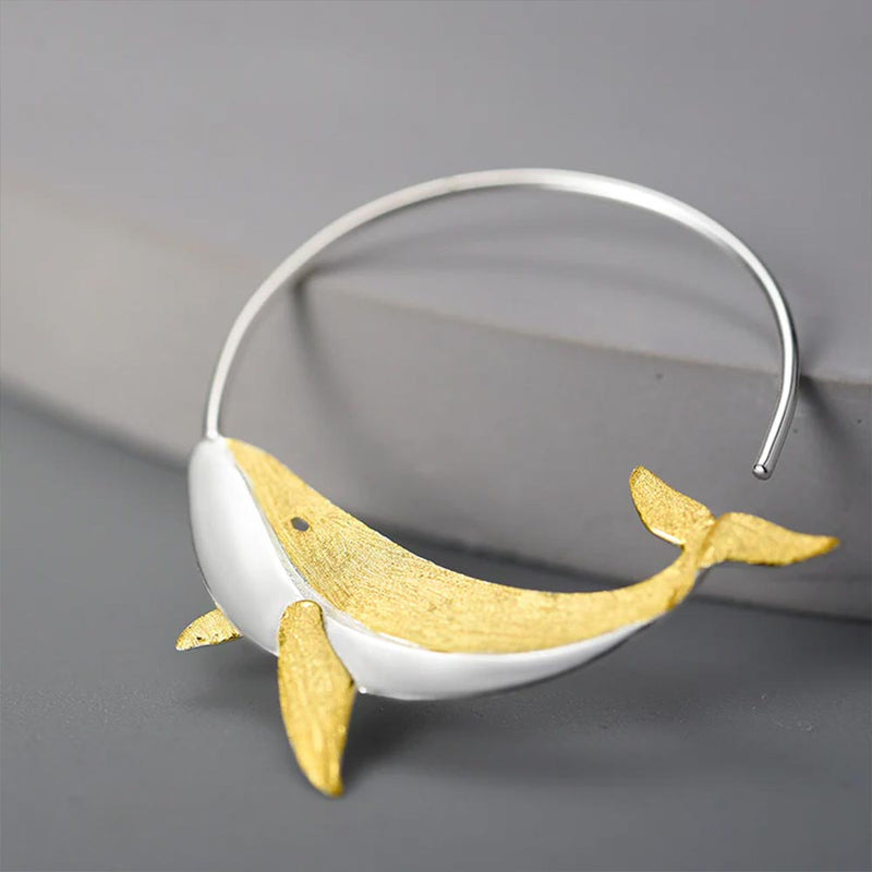 Detail of silver & gold Whale Hoop Earring