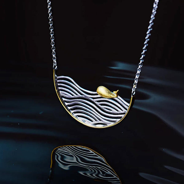 Silver and gold Roaming Whale Necklace