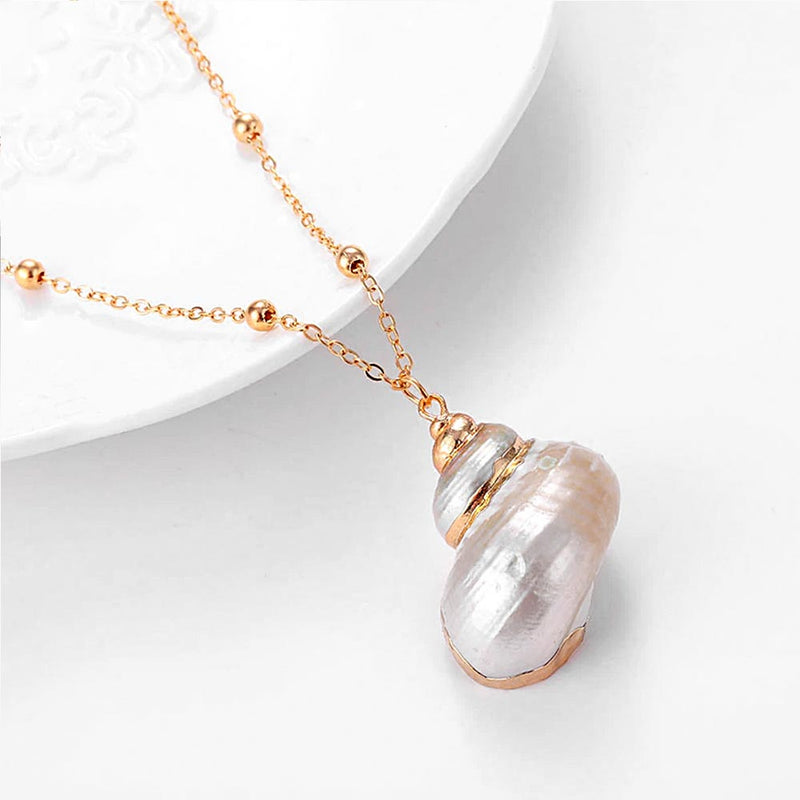White Pearl Turbo Shell pendant and gold necklace